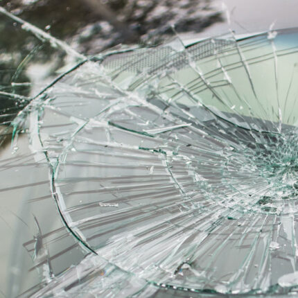 close up of shattered vehicle windshield after an auto accident Ridder Law Denver Colorado