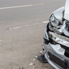 front end damage of silver vehicle after an accident Ridder Law Denver Colorado