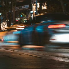 cars driving on a city street